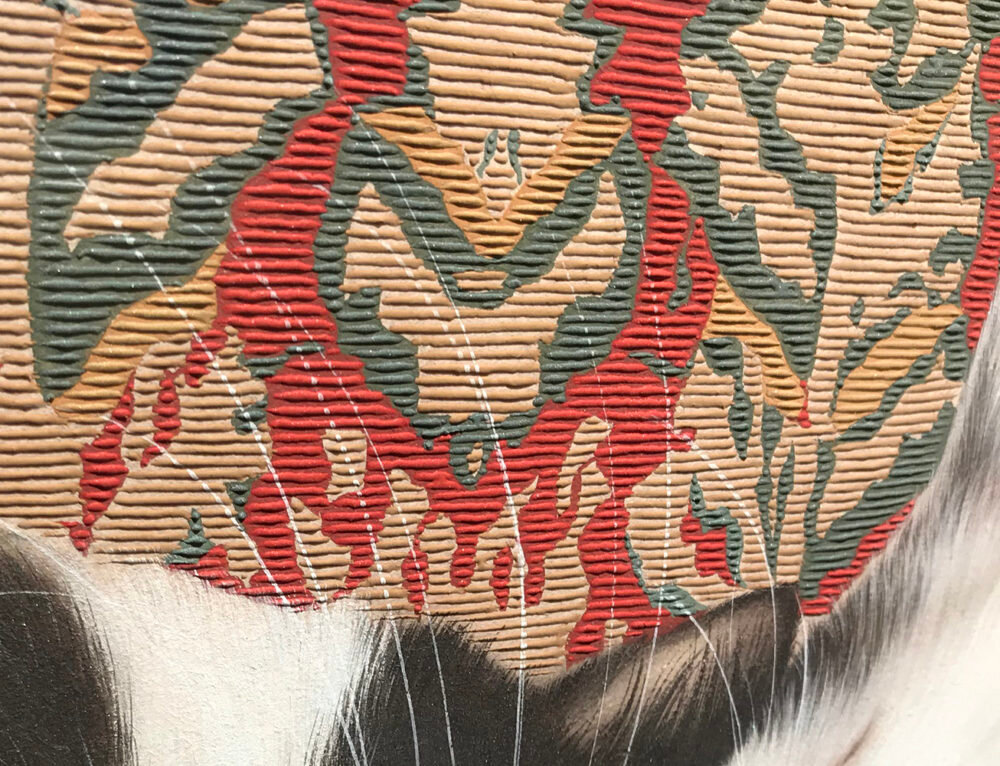 拡大:1本1本がぷっくりと盛り上がり、カーペットの柄に立体感を出しています。猫の毛のふんわり感との違いを常に意識して描いているそうです。